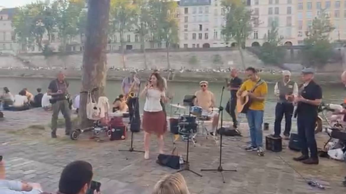 The expats jam by the river