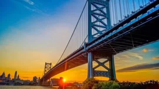 Take a Sunset Stroll over the Ben Franklin Bridge