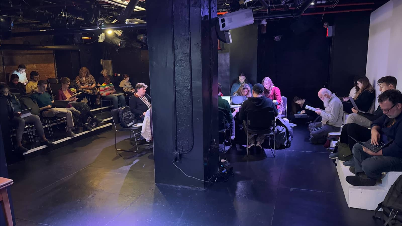 Writing group meeting in a performance space on the Upper West Side